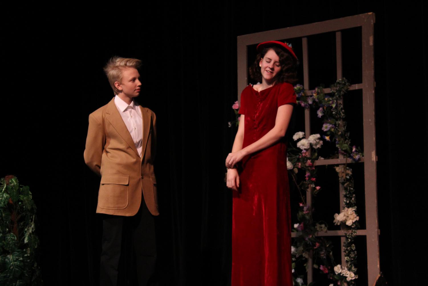 Freshman Chloe Malcolm and senior Ariel Thomas play off of each other’s characters in a mid-play scene. They had only weeks to prepare their characters, having to quickly memorize lines, find costumes, and practice with one another.