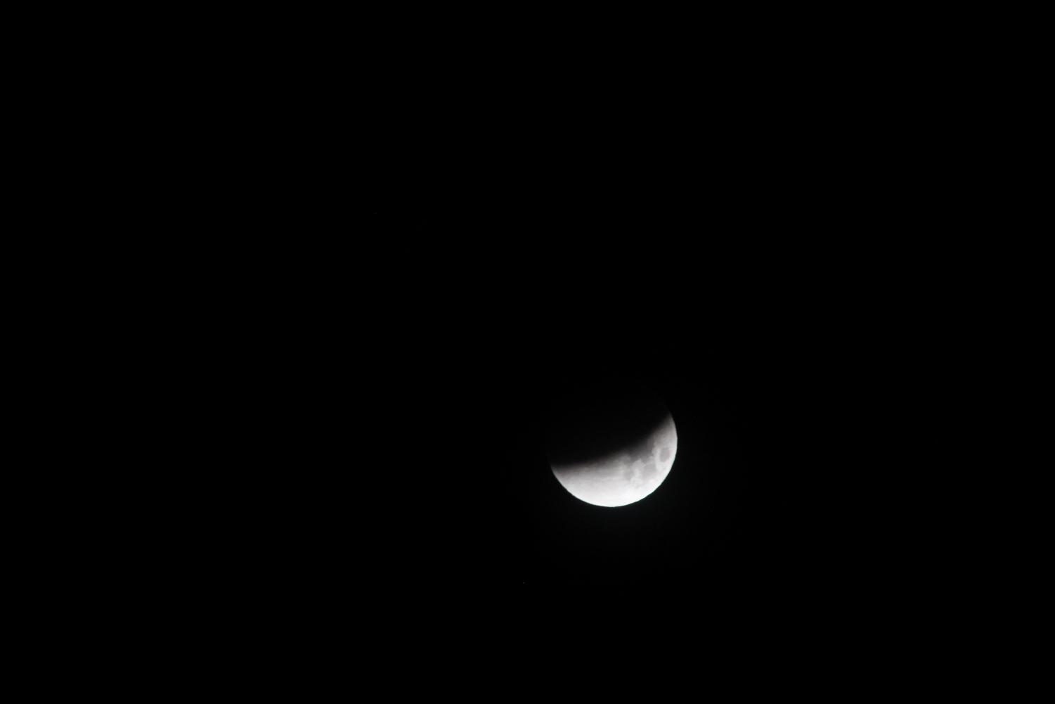 The moon was still visible with dark edges at the start. First signs appeared by 4:40 AM mountain time and the eclipse continued until around 6:00 AM.
