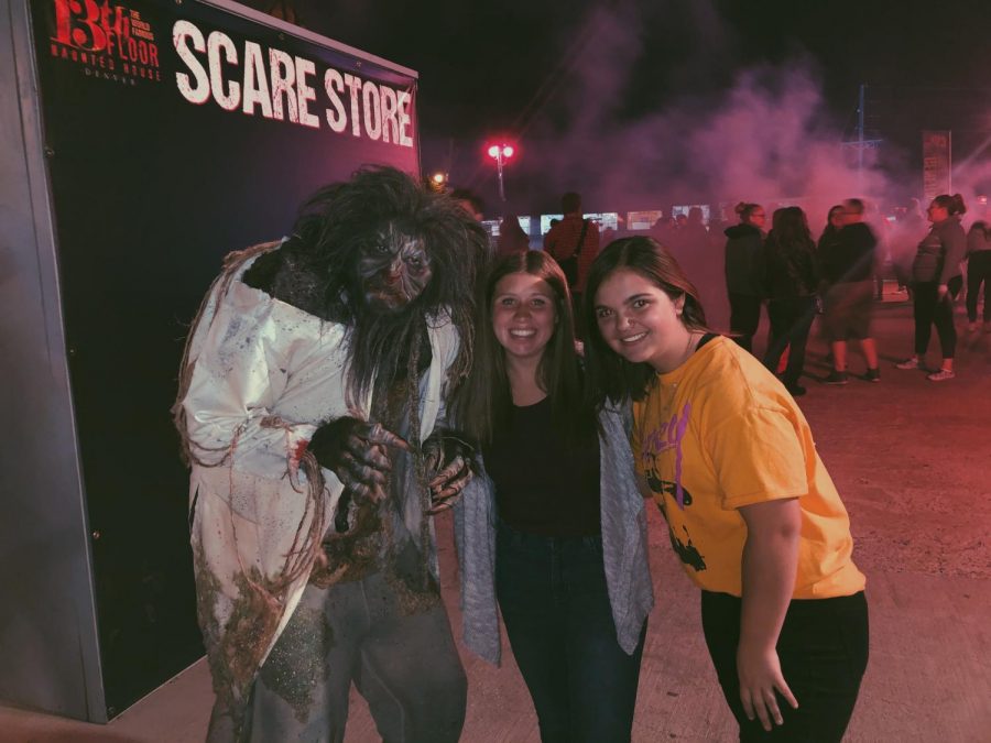 Scary Werewolf takes a quick break to mug for the camera with sophomores Ellie Woodward and Graciela Fischer at Denvers 13th Floor.