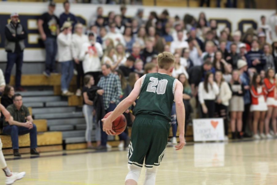 Junior Alex Ainsworth carries the ball