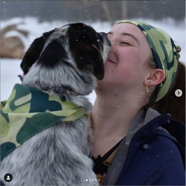 Tipsy takes a break from playing in the snow to kiss owner and trainer Alexis Hall. As I started working with her I realized she is incredibly smart, incredibly talented, and shows potential for so much more, Hall said.