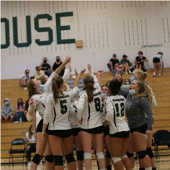 The Lady Lobos chant, preparing themselves for the next match. We put up one heck of a fight, junior Cora Spencer, the teams Libero said.