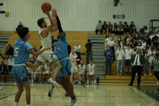 Junior Fletcher Hoban going for a layup against Widefield