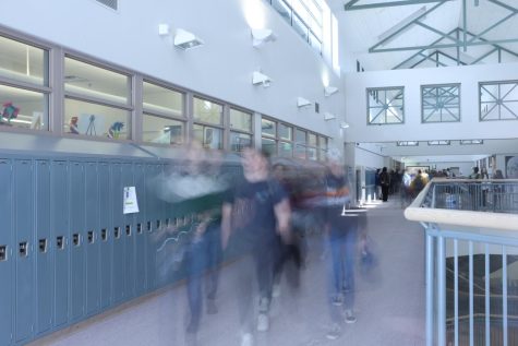 Several Conifer students walking the halls