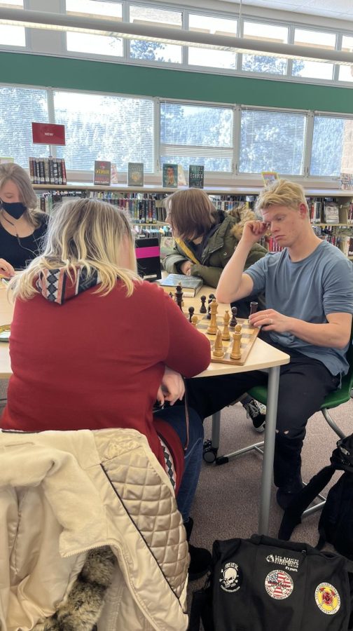 Jackson Hale competes with deep thought about his next move. Hale has brought a few members to the club to share his love of chess with others.