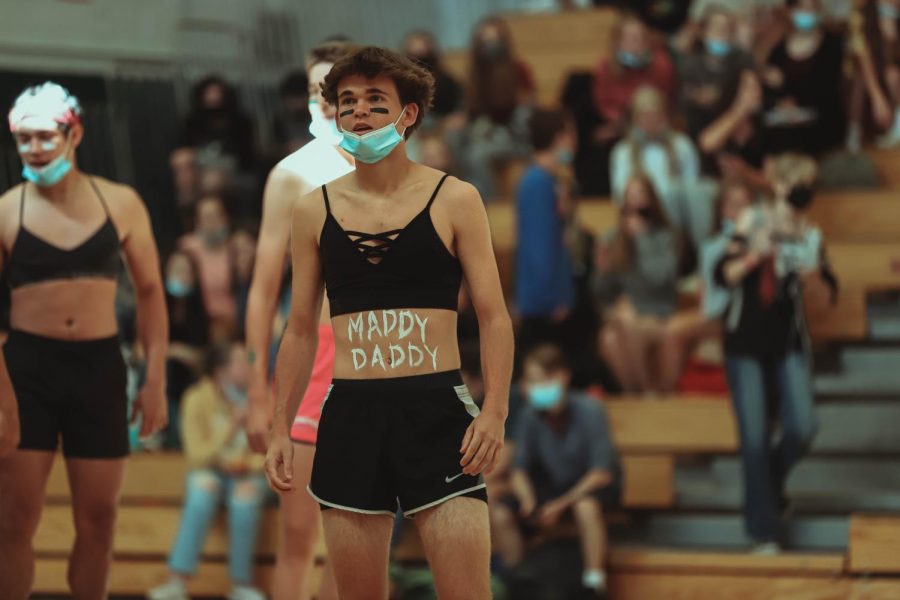Senior Maddox Rife plays in the 2021-2022 Muscle Match. The new dress code for the game this year will make it so players are unable to wear sports bras or body paint with suggestive messages at the event.