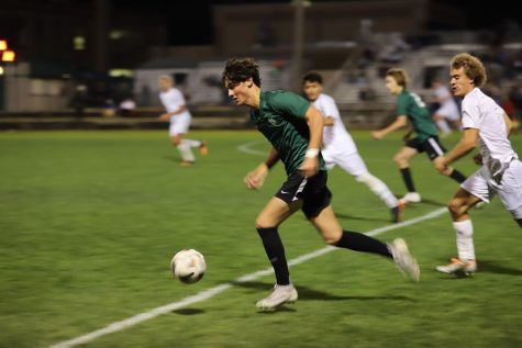 Junior Miles Garrison dribbles with pace into the attacking half. Garrison is currently the top goal scorer for the Conifer Boys soccer with a total of 12 goals this season, as well as 7 assists. One of these 12 goals was from the Wheat Ridge game, when he scored the second goal for Conifer off a free kick from Grant Kirklin.