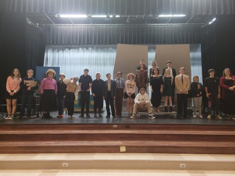 After the joint Choir and theatre performance on December 7th, both groups line up to get a photo together. “Y’all did it and I’m proud of you. I’m happy to have played the role I did and that everyone did so well performing,” sophomore Maddy Fletcher said. (Finn Stein)