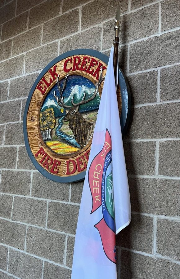 The+logo+and+flag+for+the+Elk+Creek+Fire+Department.+They+hold+a+tremendous+role+in+the+community+by+making+sure+Conifer+is+protected+from+wildfire+and+other+emergencies.+%E2%80%9CIt%E2%80%99s+crazy+how+many+people+don%E2%80%99t+know+who+their+fire+department+is%2C%E2%80%9D+Ware+said.+