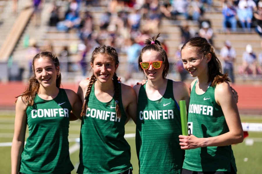 The girls 4x800 team poses for a photo to celebrate their season PR. From left to right, Gianna Cicorca, Audrey VanWestrienen, Evelyn Bly, Kate Horneck.
