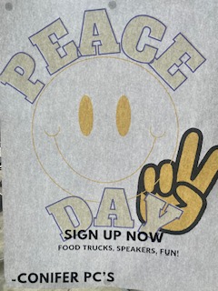 Peer counselors have printed multiple flyers and posters to remind people to sign up for Peace Day and to show the opportunities the event offers. This poster is located in the lobby of Conifer High School for students to see. Other posters have barcodes for the students to scan on their phones to sign up for food trucks and speakers on Peace Day.