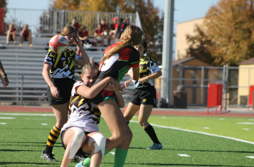 The Mountain Area Lumberjacks girls' rugby JV team faced off against the Fort Collins Hammers on Saturday, November 2nd at the state tournament. Evelyn Westwood passes the ball to a teammate in the first half as the Lumberjacks go on to win 22-5. “Rugby is such a welcoming sport—I never thought I’d enjoy it as much as I do,” Westwood said.