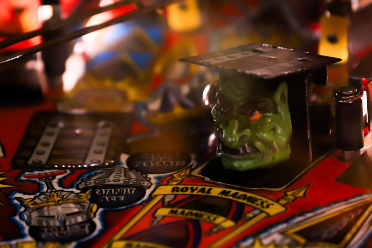 A ball hits a troll popup in the pinball game, “Medieval Madness.” The game was one of the 40 machines that were part of the Colorado State Pinball Championship held at Blizzard Mountain Pinball in Conifer. Every year, the championship rotates between locations and ensued despite the snow as state must be held on the same date across all states. “The player base, the talent pool, and the quality of tournaments here in North America are just much higher than outside of it,” IFPA State Representative for Colorado Snow Galvin said. 
