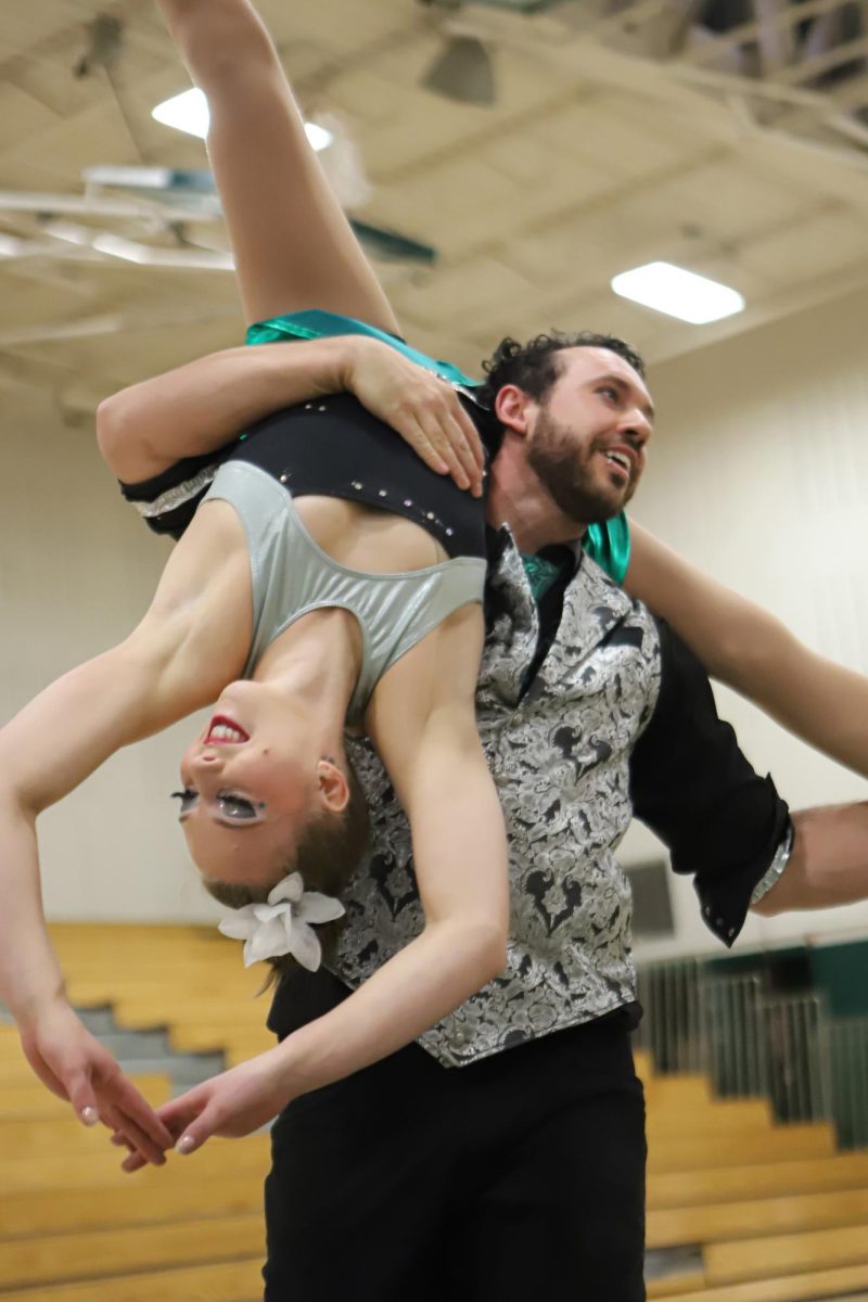 Cassidy Vallin (Left) and Bryan Connolly (Right) from Circus Foundry dance as a part of their show during the opening ceremony of Conifer High School’s 9th annual Peace Day. Circus Foundry is a Denver-based contemporary circus that formed to share their art, help others in the process, and support local under-represented demographics in community gatherings. “Our main goal with your show was to be able to share the excitement of what the circus brings to people throughout the world,” Vallin said.