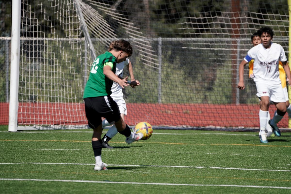 Conifer senior scores a goal during his third year as a captain with Conifer's varsity boys soccer team. “It's always been his dream to play in college and he's getting there” Rhoan's mom Yvonne Cristovici said. (Courtesy of Yvonne Cristovici) 

