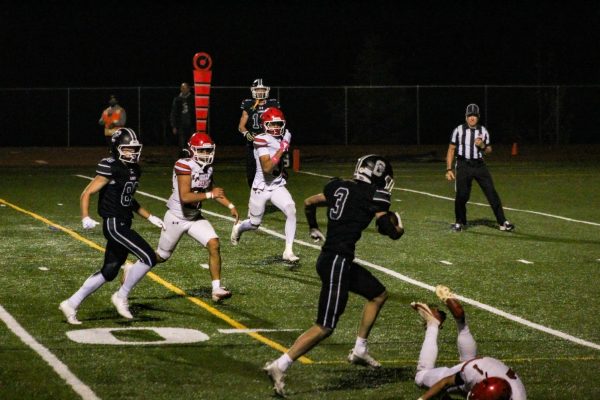 Senior Varsity player Dylan Warner runs a touchdown during the October 3rd against Glenwood. With an overall score of 6-1, Varsity's fall 2025 season has placed them first in the 3A West Metro League so far. "Overall we've been really killing it on the field. I've had a great time this season just playing with my friends and having fun," Warner said.
