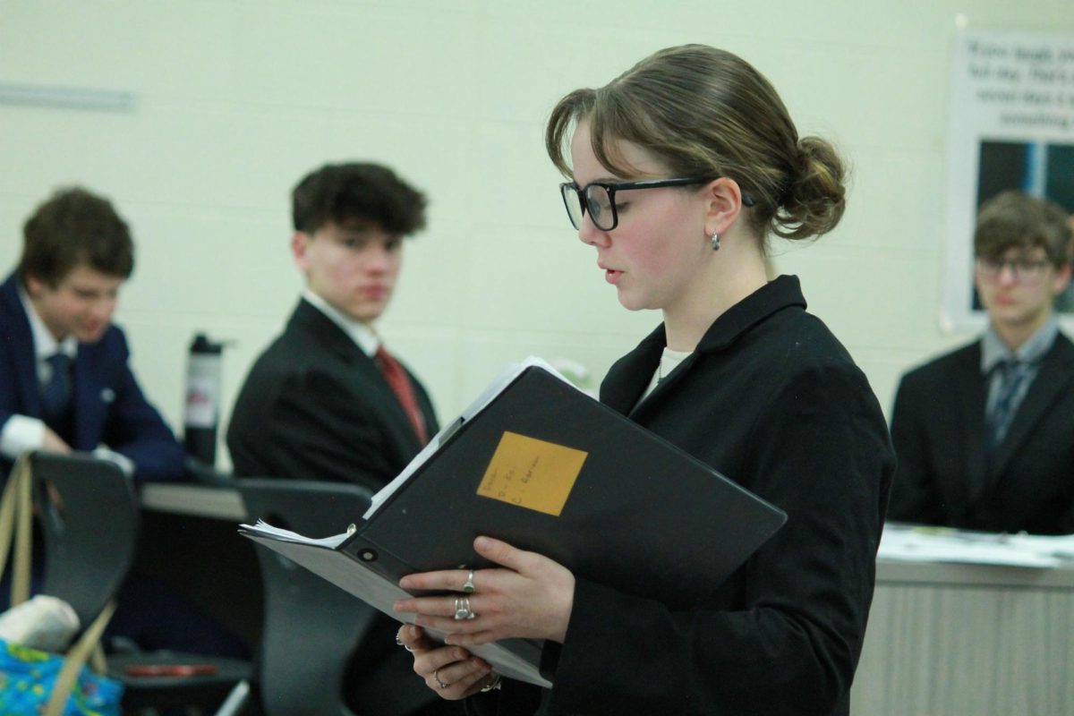Junior Doran Reed speaks at one of the final mock trial practices before last season's competition.
